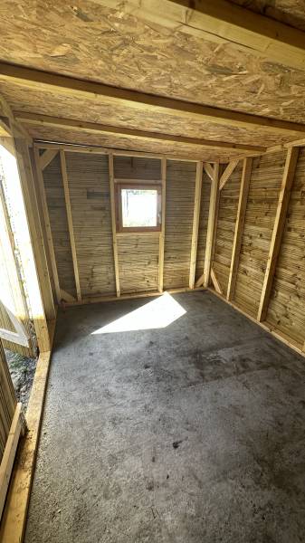 artisan spécialisé en réalisation d'abri bois sur mesure autour de moi